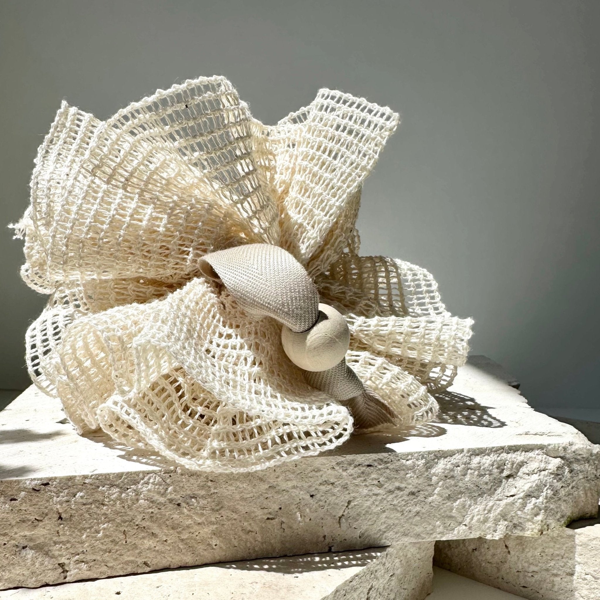 Organic-cotton-shower-puff-natural-colour