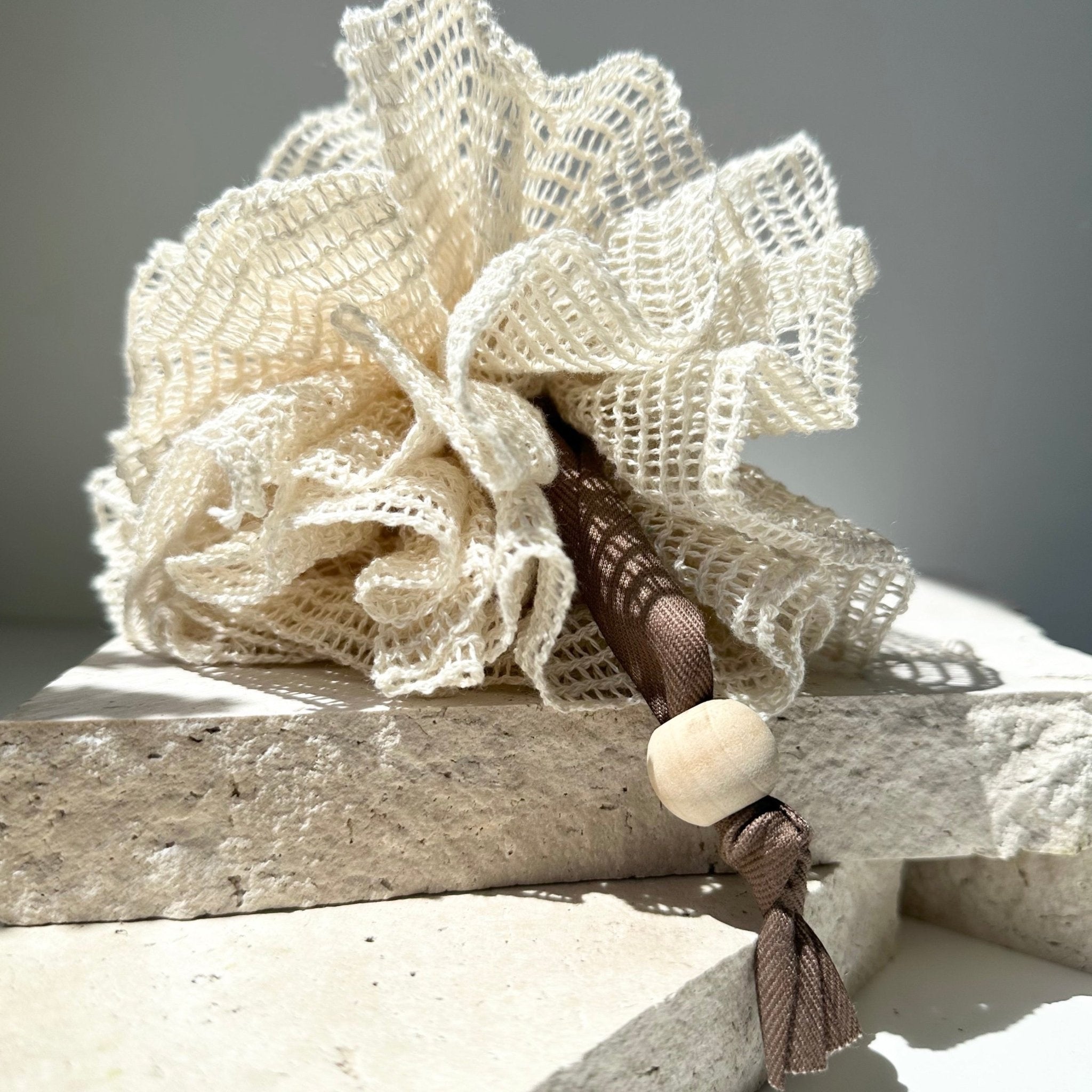 Organic-cotton-shower-puff-sand-colour